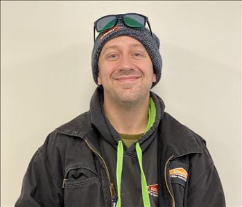 SERVPRO employee with beanie and sunglasses on head