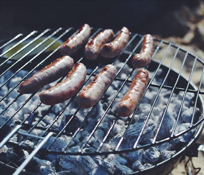 grilling sausages, charcoal
